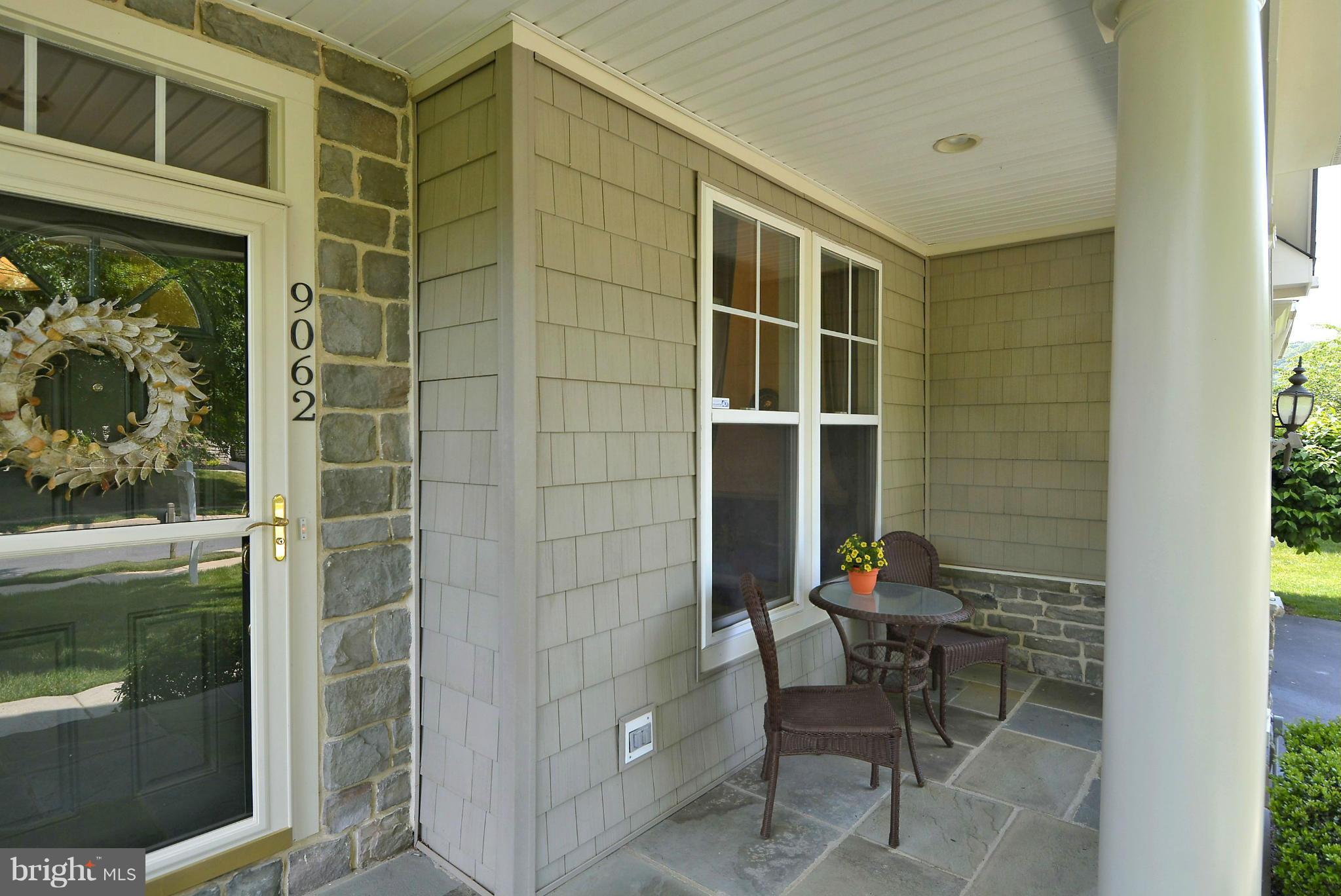 9062 Roaring Spring Loop Bristow, VA 20136 - Photo 2 of 30 Say hello to neighbors from the lovely front porch