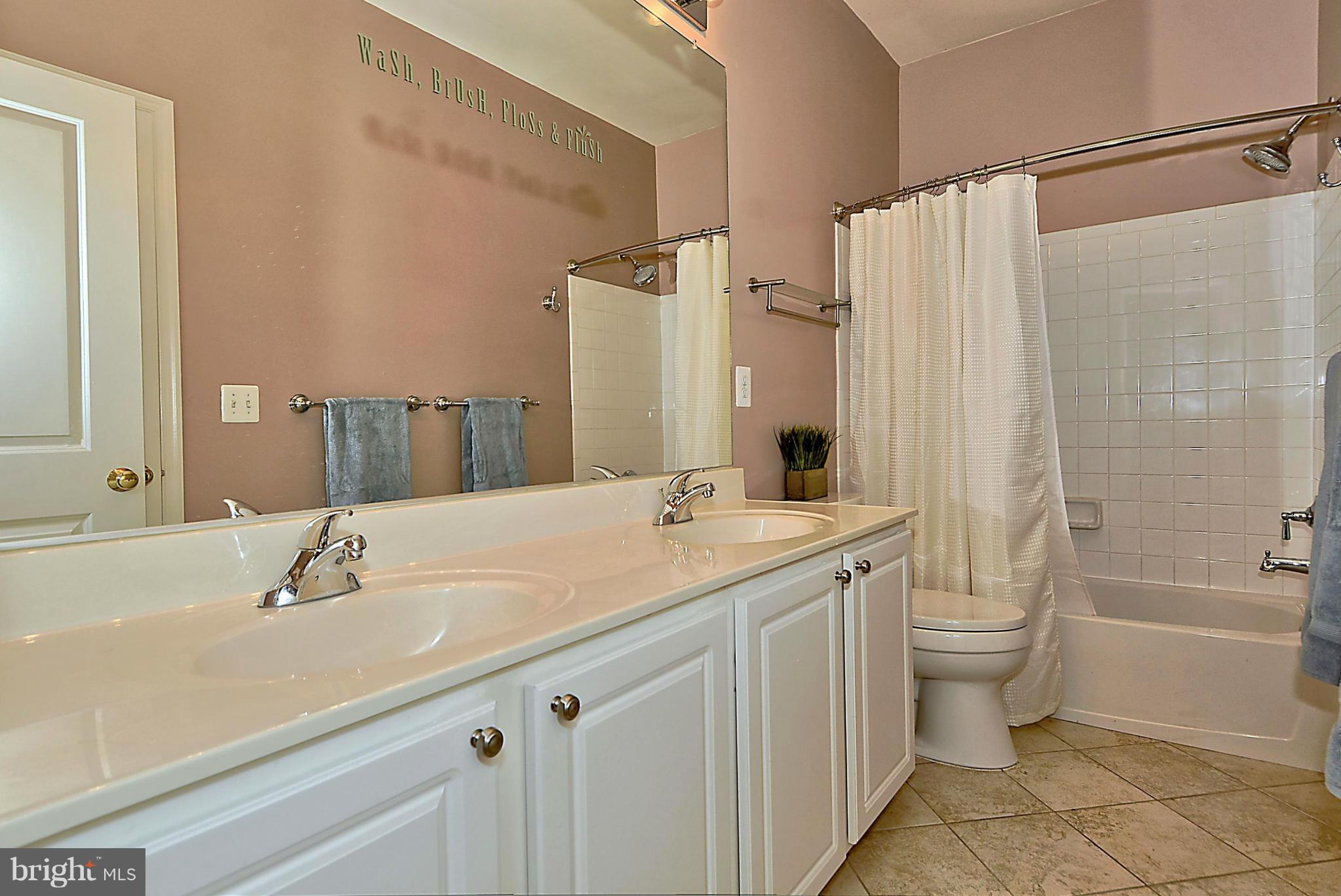 9062 Roaring Spring Loop Bristow, VA 20136 - Photo 20 of 30 No fighting for sink time in this spacious bath!