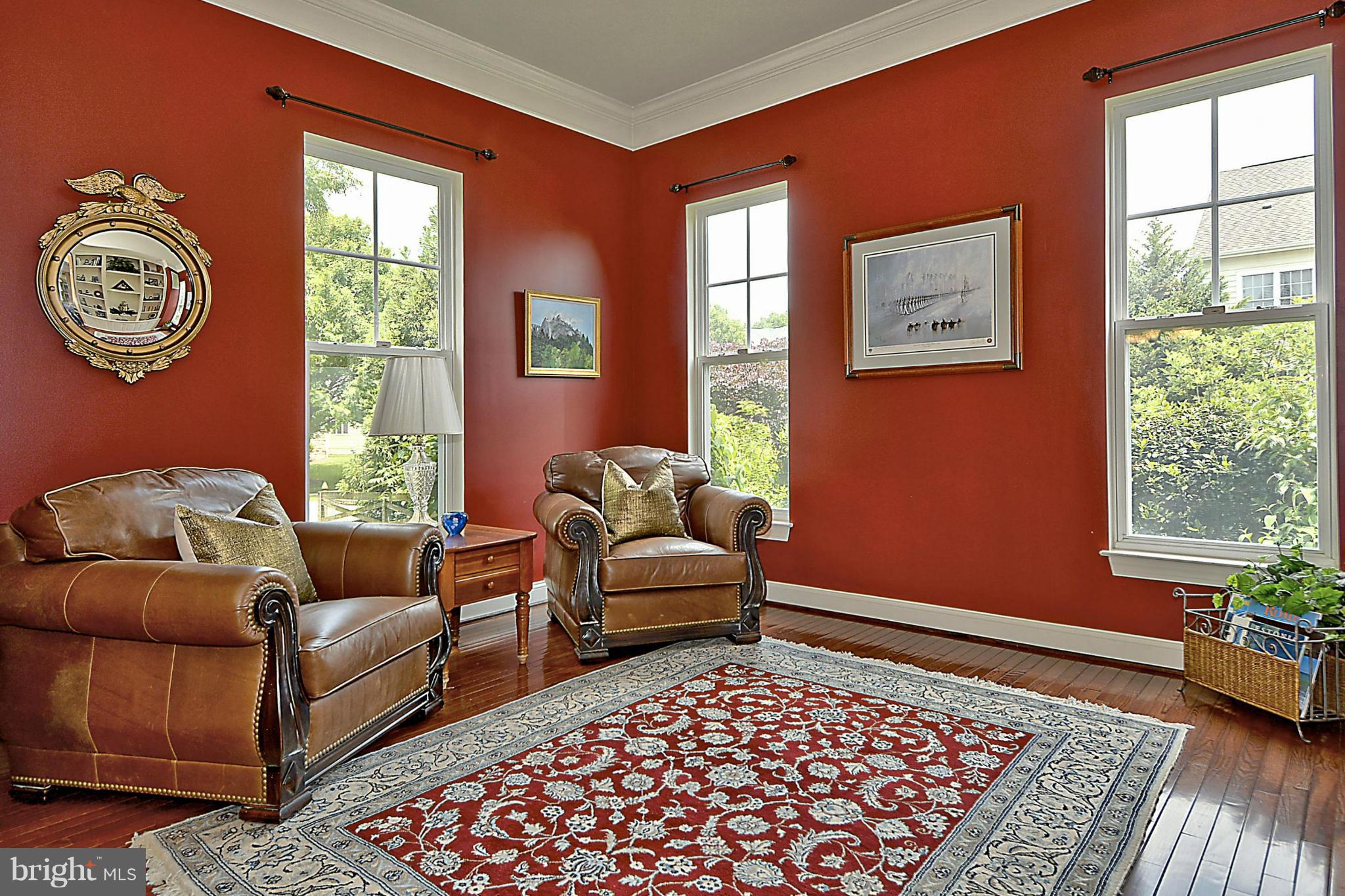 9062 Roaring Spring Loop Bristow, VA 20136 - Photo 3 of 30 Formal living rm flooded w/natural light!
