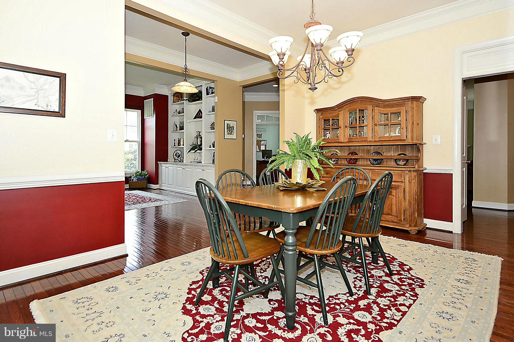9062 Roaring Spring Loop Bristow, VA 20136 - Photo 5 of 30 9 ft ceilings, crown molding, upgraded lighting!