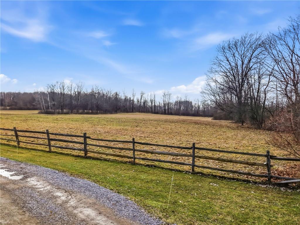 0 Roman Mercer, PA 16137 - Photo 4 of 22 a view of a lake with houses in the back