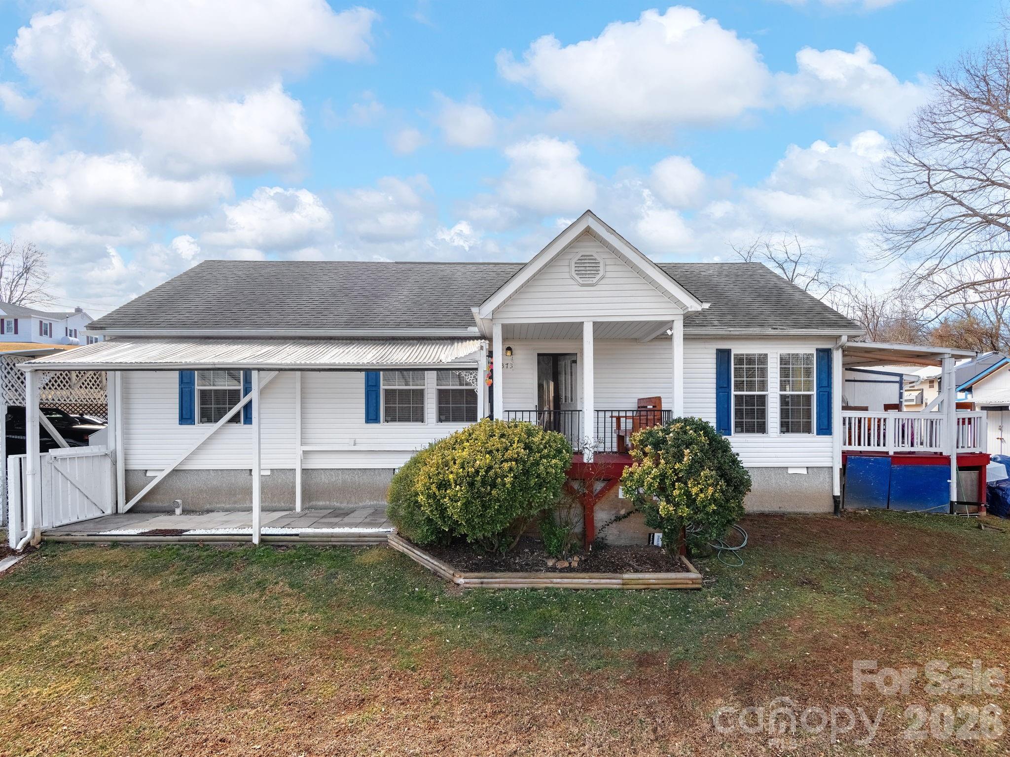 373 Starnes Cove Road Candler, NC 28715 - Photo 1 of 21 a view of a house with a yard
