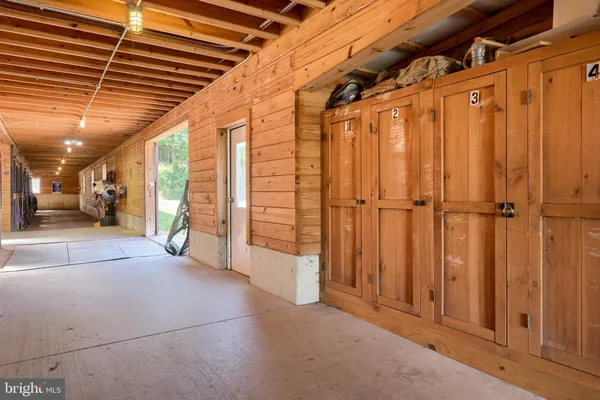 a view of a room with wooden walls