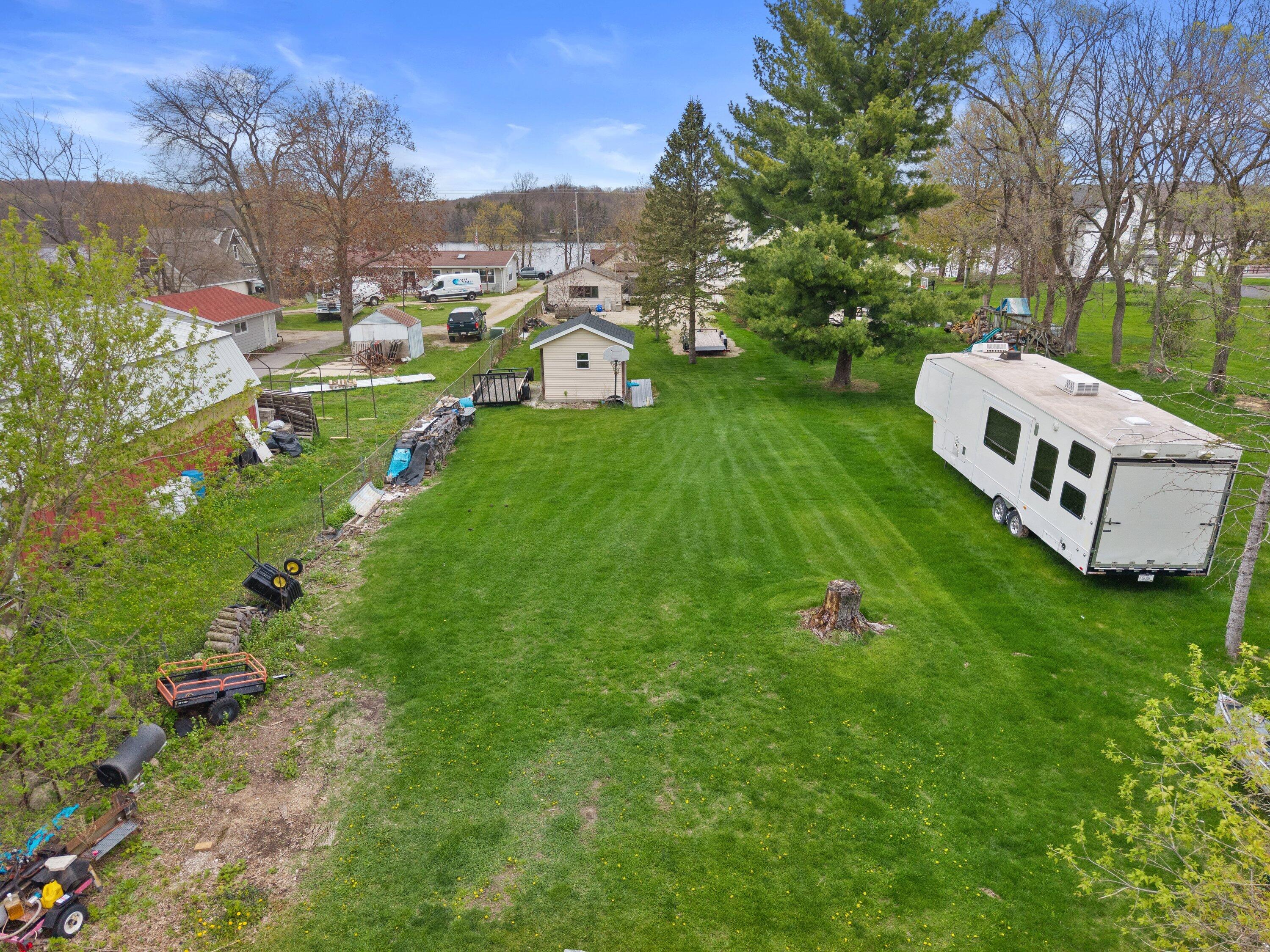 N95-w26705 County Rd Q Hartland, WI 53029 - Photo 35 of 55 DJI_20260430150509_0471_D