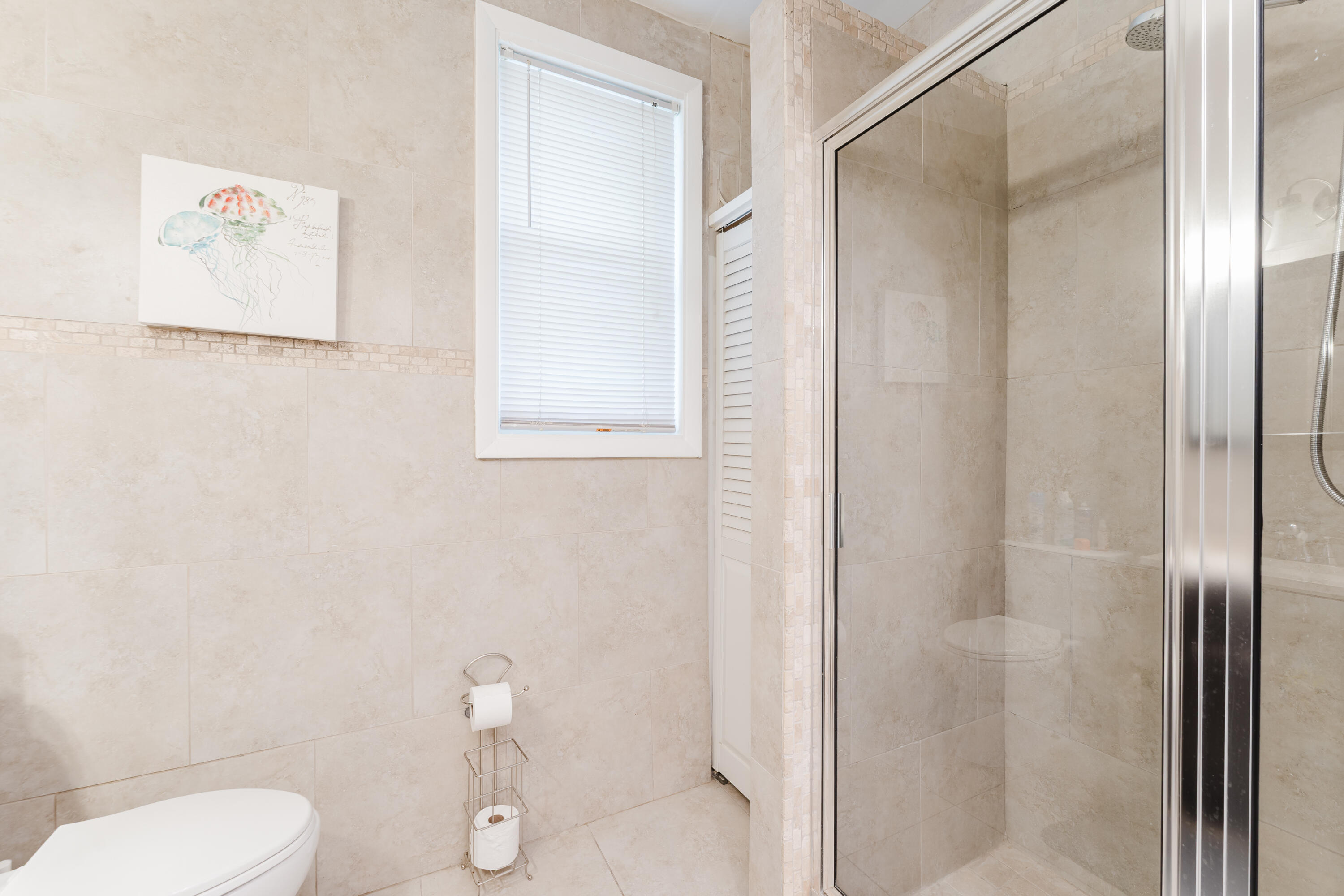 700 East Palmetto Park Road Boca Raton, FL 33432 - Photo 13 of 27 a bathroom with a toilet