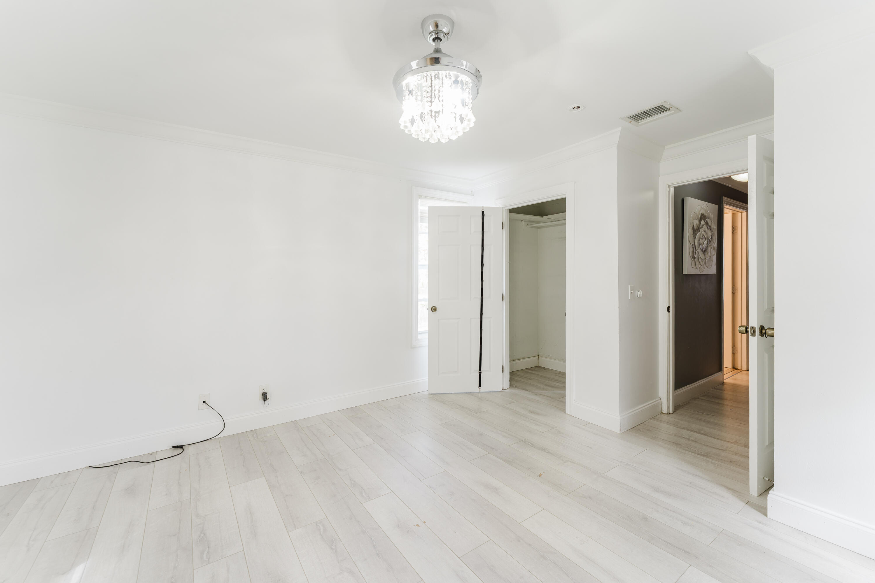 700 East Palmetto Park Road Boca Raton, FL 33432 - Photo 22 of 27 wooden floor in an empty room