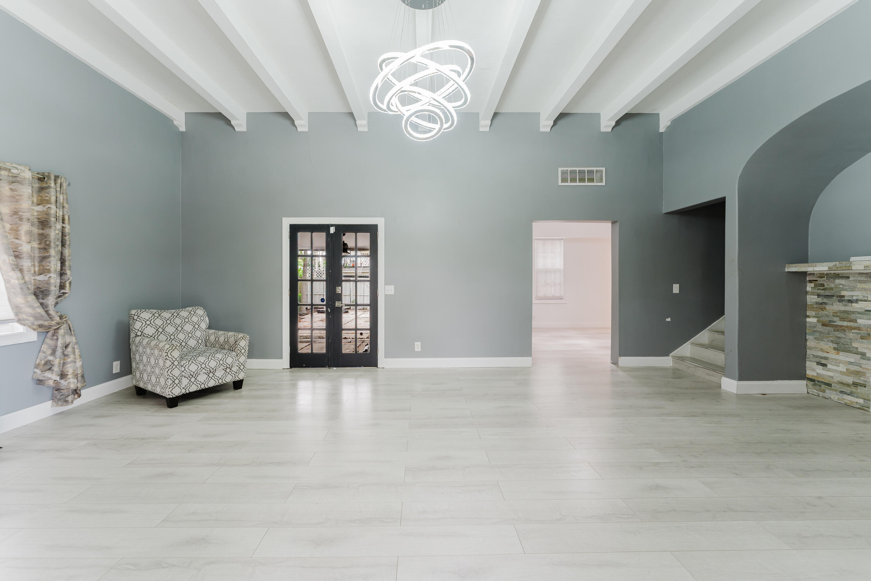 700 East Palmetto Park Road Boca Raton, FL 33432 - Photo 4 of 27 a view of an empty room with a window