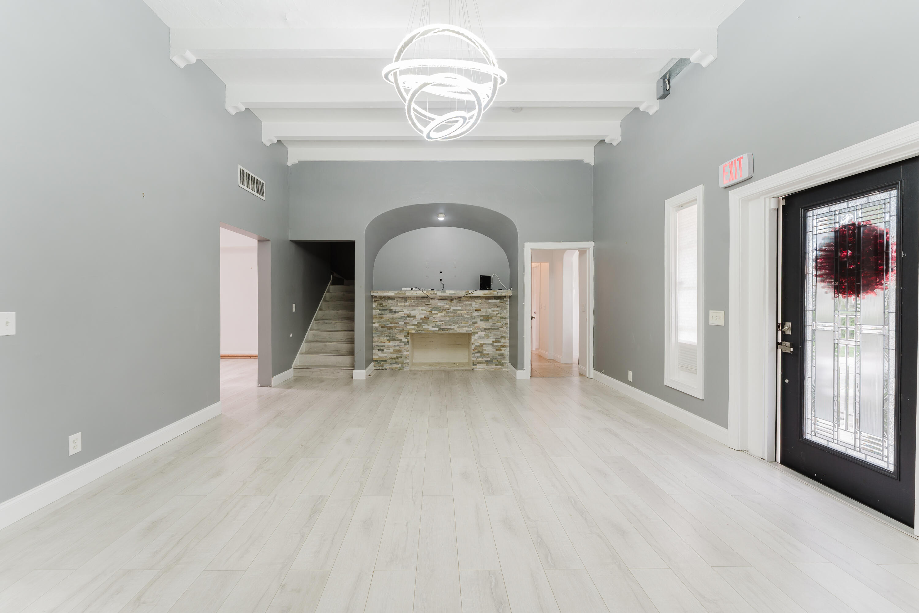 700 East Palmetto Park Road Boca Raton, FL 33432 - Photo 6 of 27 a view of a livingroom with a furniture windows and a chandelier