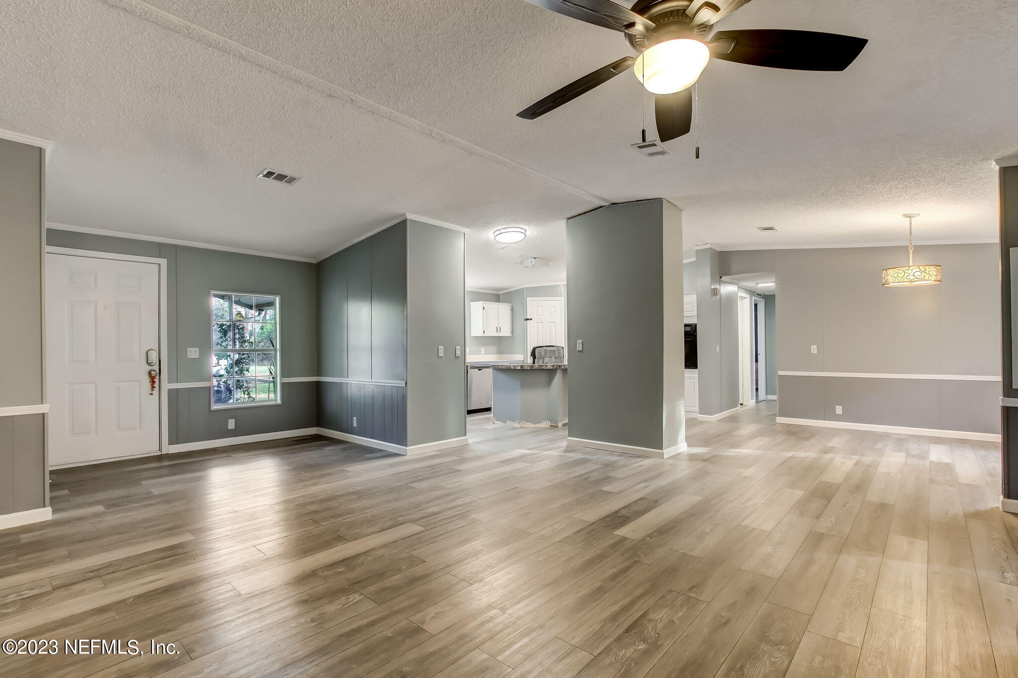 44124 Maple Court Callahan, FL 32011 - Photo 16 of 44 Living room / Dining / Kitchen