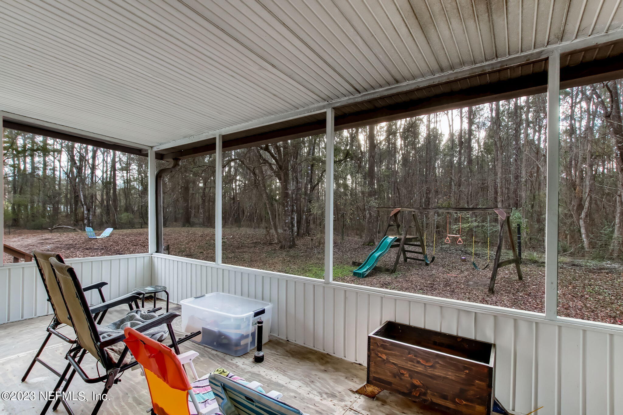 44124 Maple Court Callahan, FL 32011 - Photo 19 of 44 Screened Patio outback