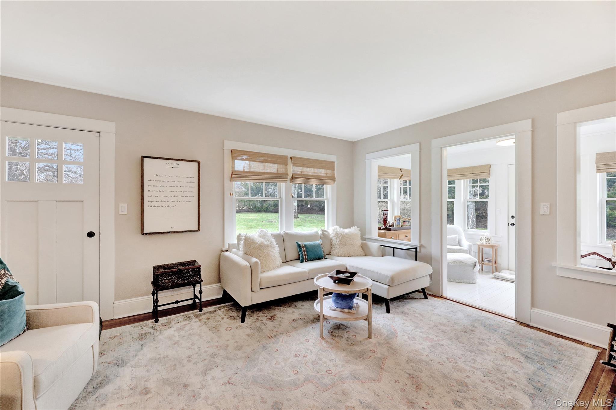 198 South Country Road Remsenburg, NY 11960 - Photo 13 of 49 a living room with furniture and a large window