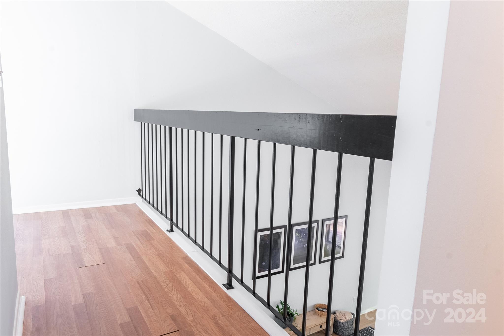 6714 Thermal Road Charlotte, NC 28211 - Photo 14 of 25 a view of a hallway with wooden floor