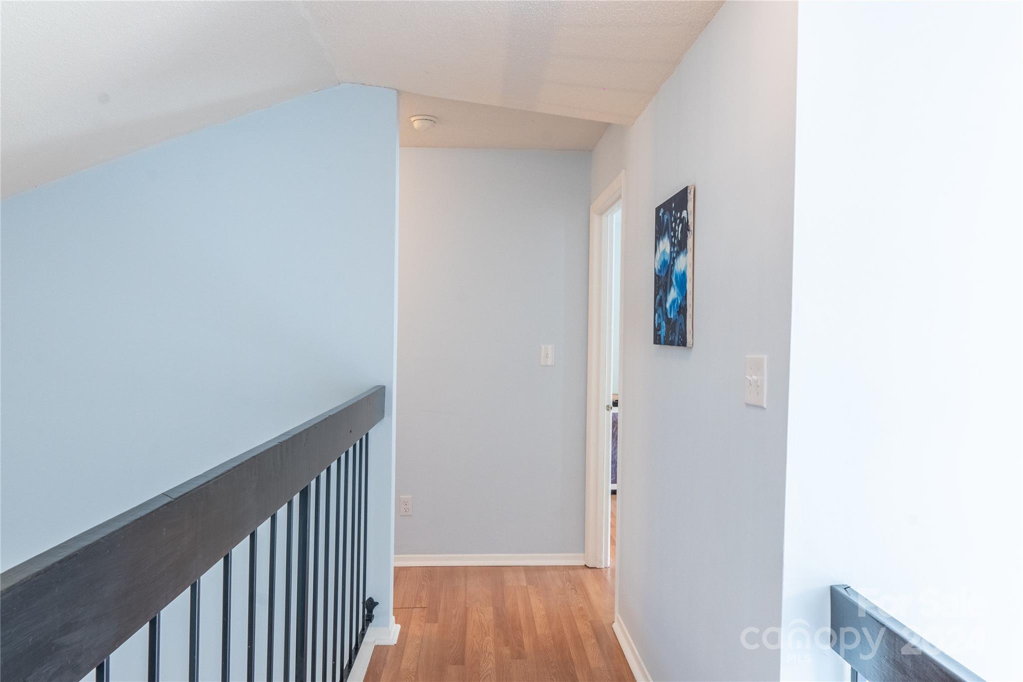 6714 Thermal Road Charlotte, NC 28211 - Photo 15 of 25 a view of a hallway with wooden floor