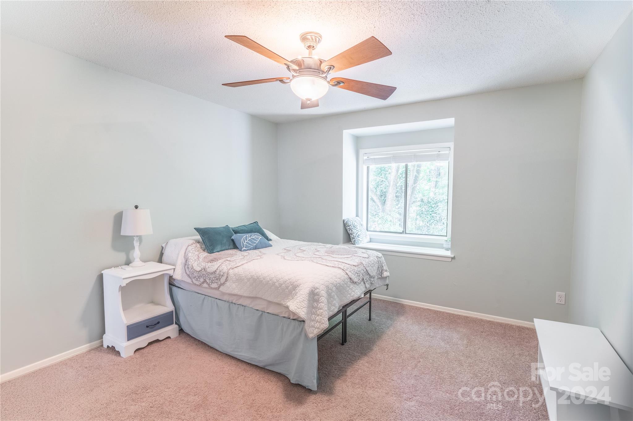 6714 Thermal Road Charlotte, NC 28211 - Photo 16 of 25 a bedroom with a bed and window
