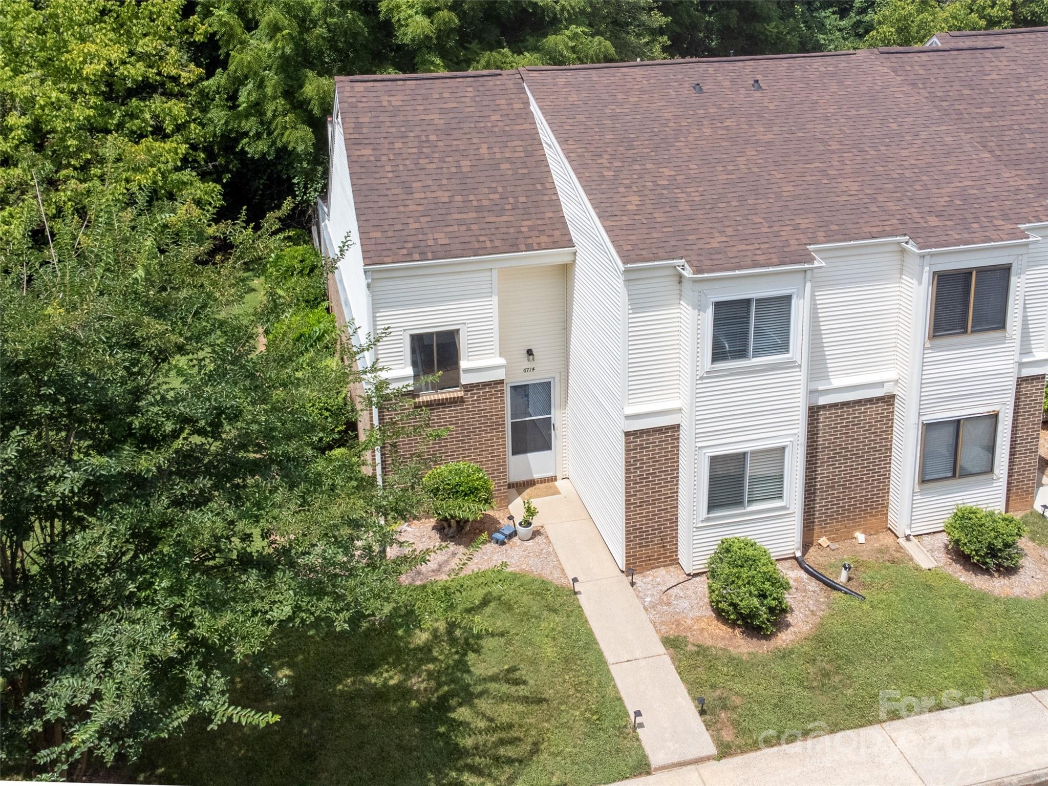 6714 Thermal Road Charlotte, NC 28211 - Photo 2 of 25 front view of a house with a yard