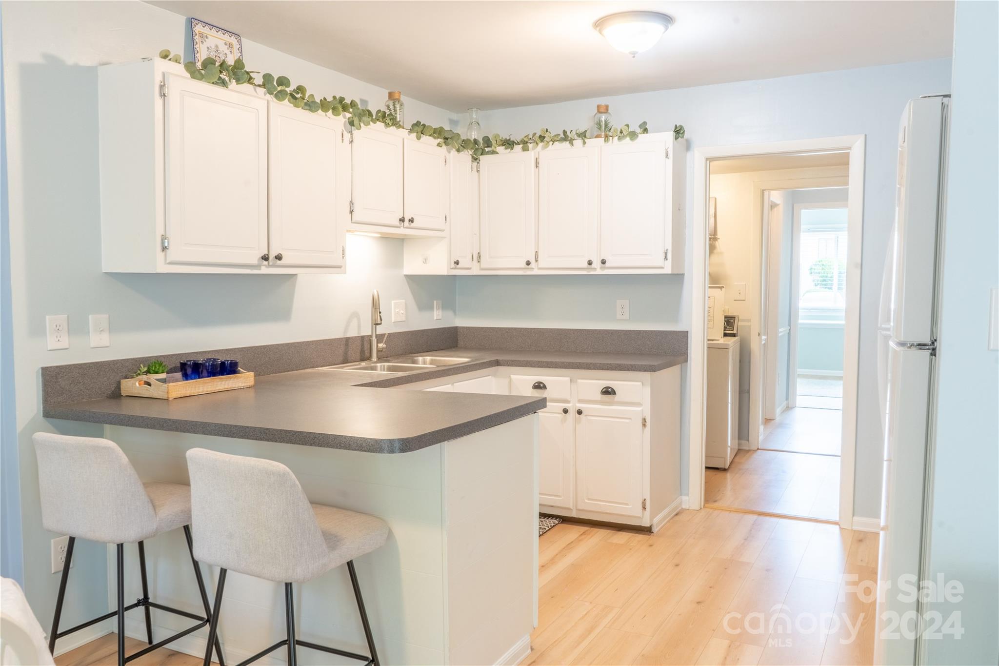 6714 Thermal Road Charlotte, NC 28211 - Photo 7 of 25 a kitchen with a sink cabinets and window