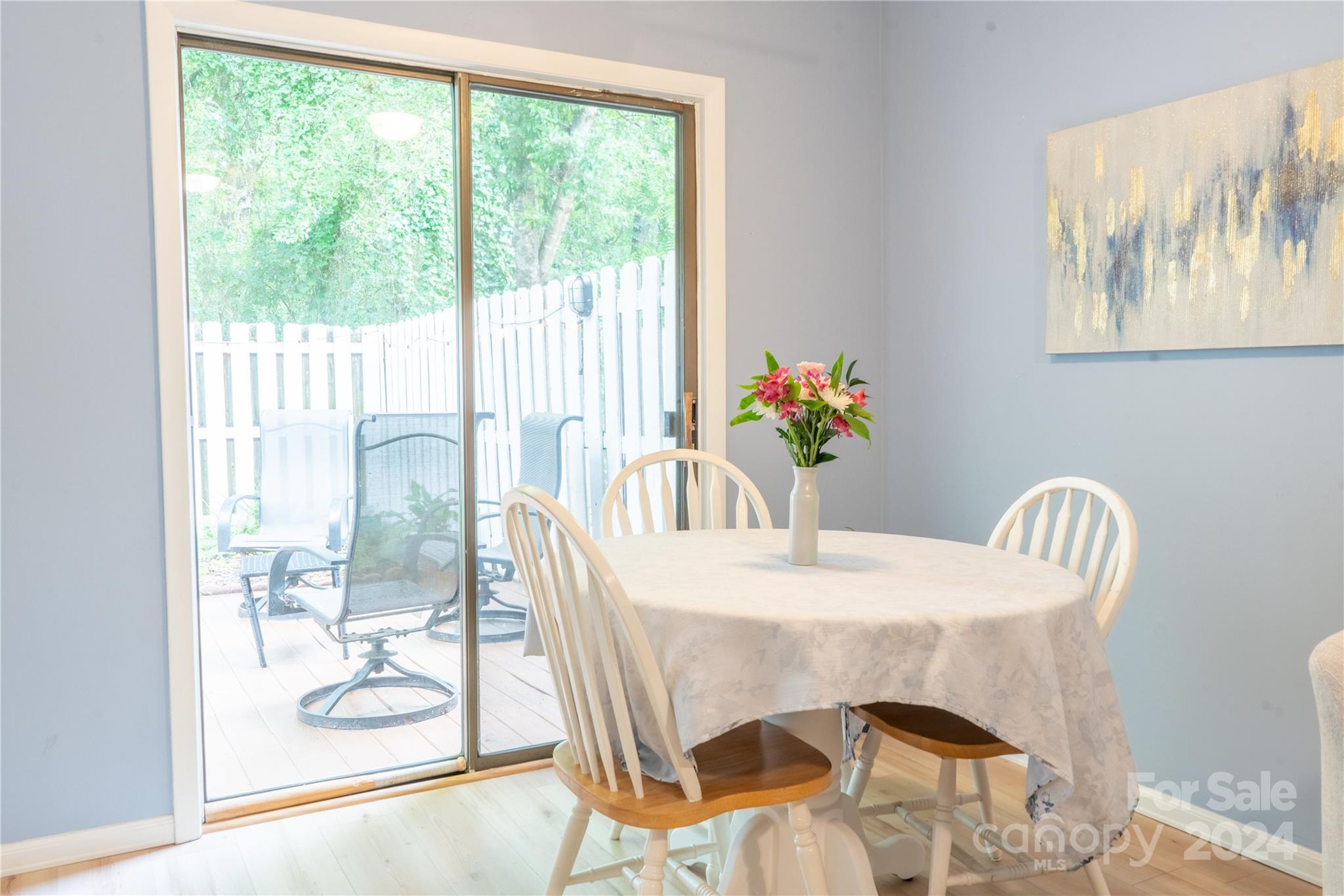 6714 Thermal Road Charlotte, NC 28211 - Photo 8 of 25 a view of a dining room with furniture wooden floor and a potted plant