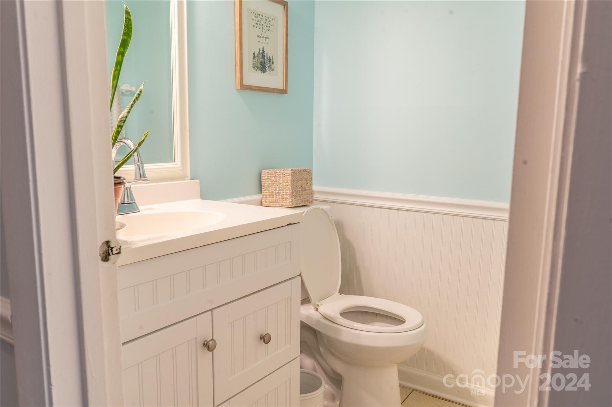 6714 Thermal Road Charlotte, NC 28211 - Photo 10 of 25 a bathroom with a sink a toilet and a window