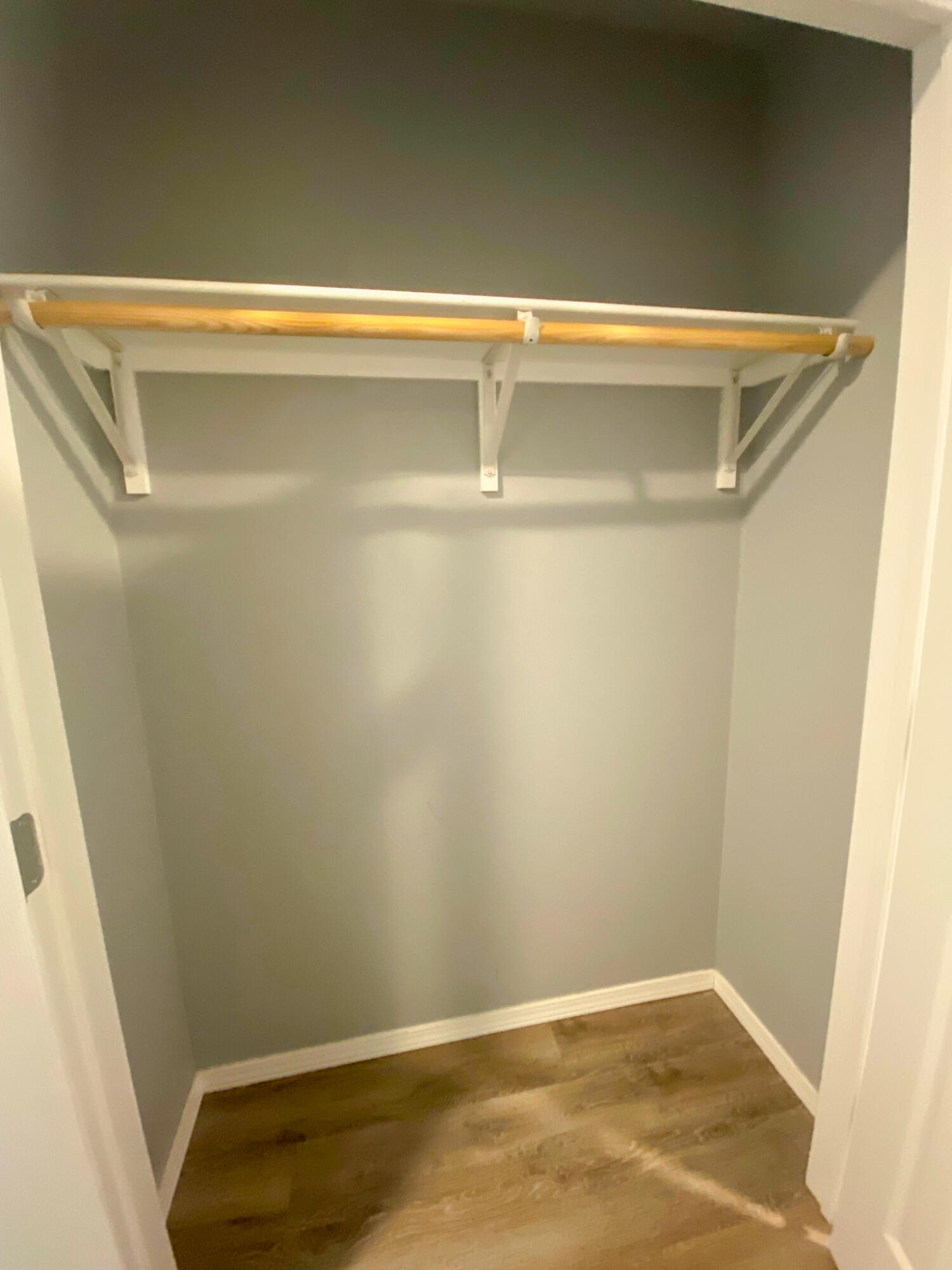 8605 10th Place Lubbock, TX 79416 - Photo 8 of 18 a view of a room with wooden floor