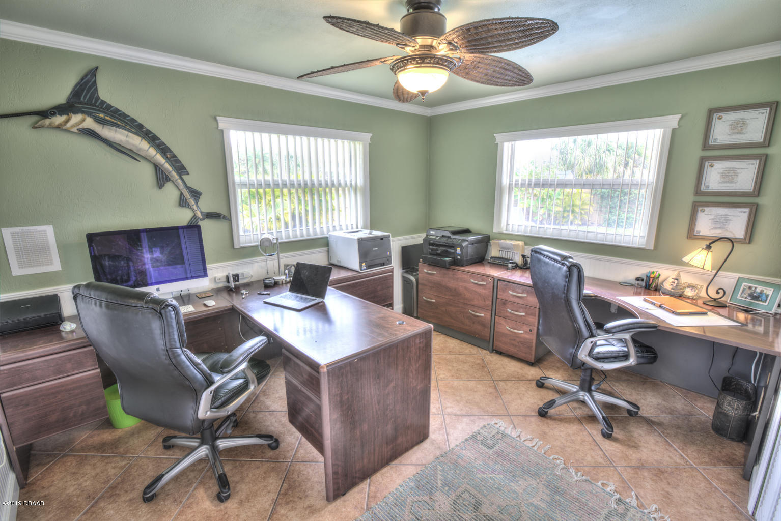 102 Marie Drive Ponce Inlet, FL 32127 - Photo 21 of 32 a view of a workspace with furniture and a window