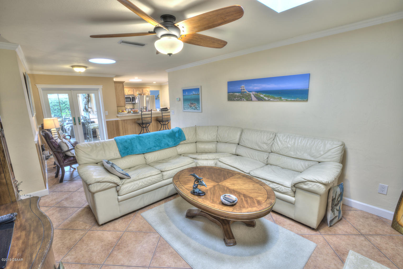 102 Marie Drive Ponce Inlet, FL 32127 - Photo 10 of 32 a living room with furniture and a fireplace