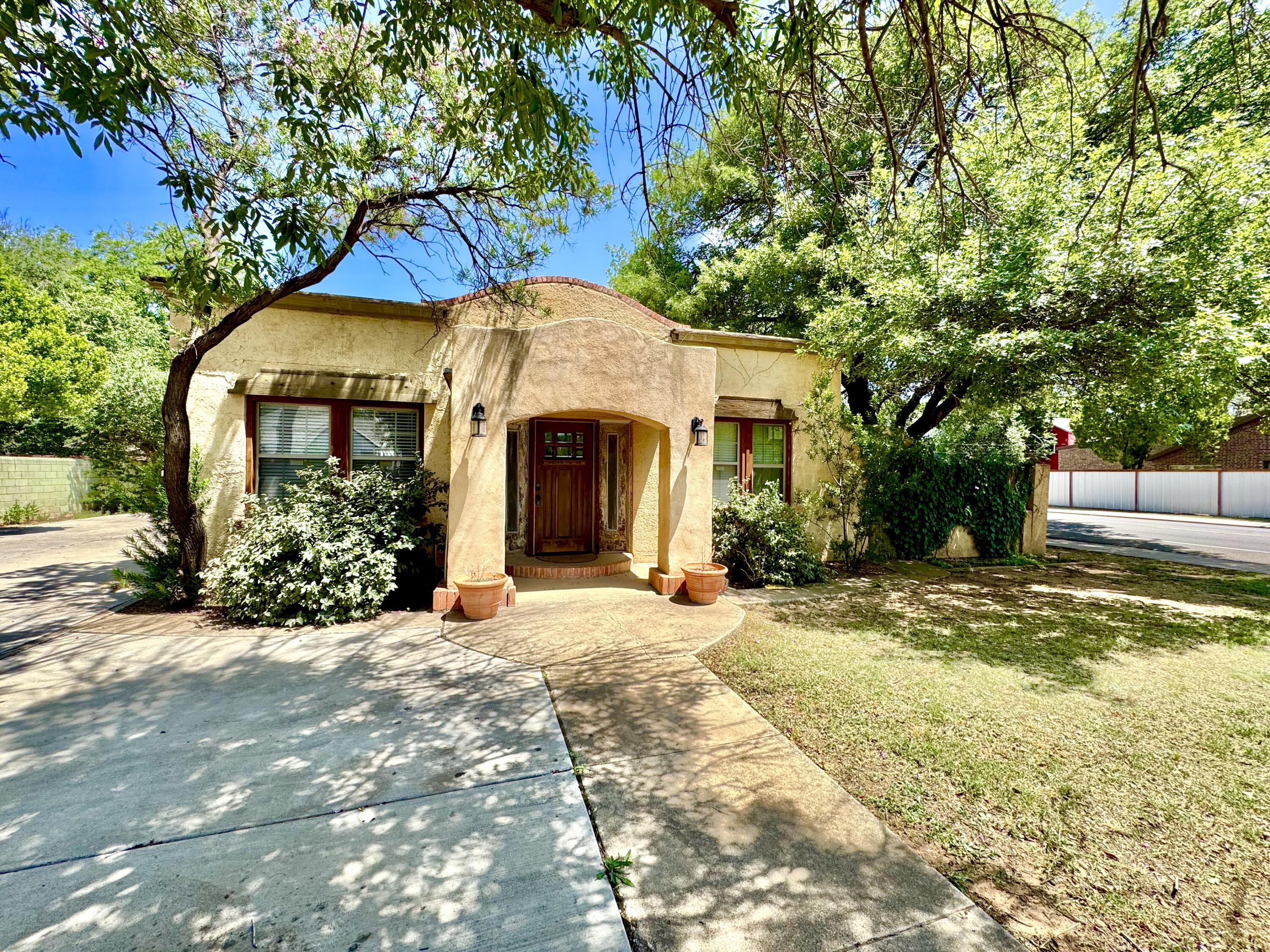 a front view of a house with a porch