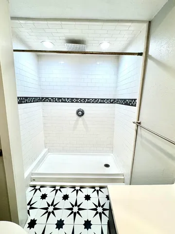 a bathroom with a bath tub