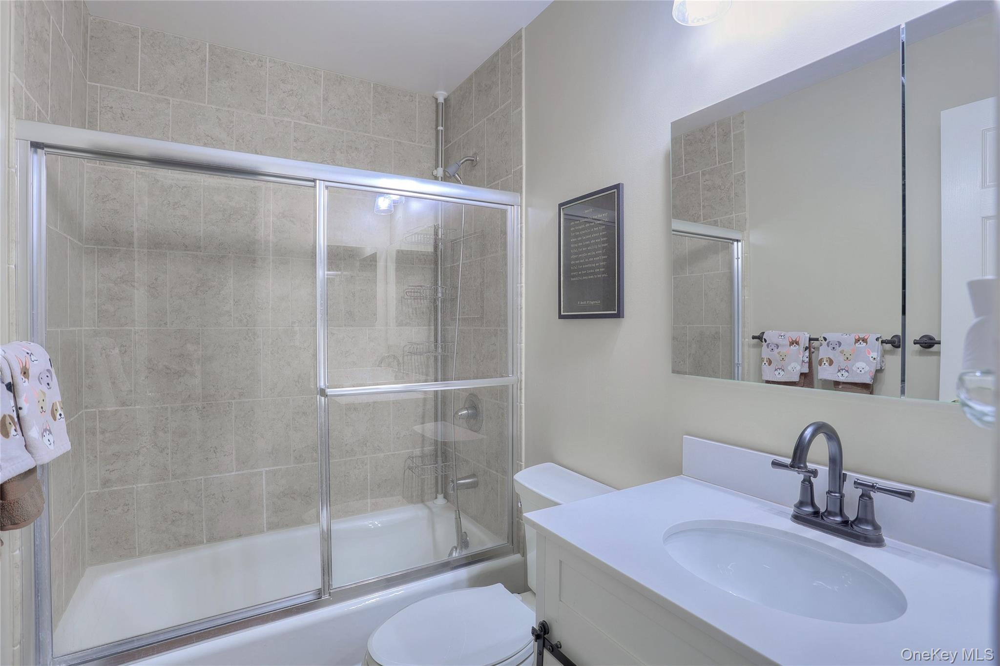 47 Camp Hill Road Pomona, NY 10970 - Photo 16 of 30 a bathroom with a sink toilet and shower