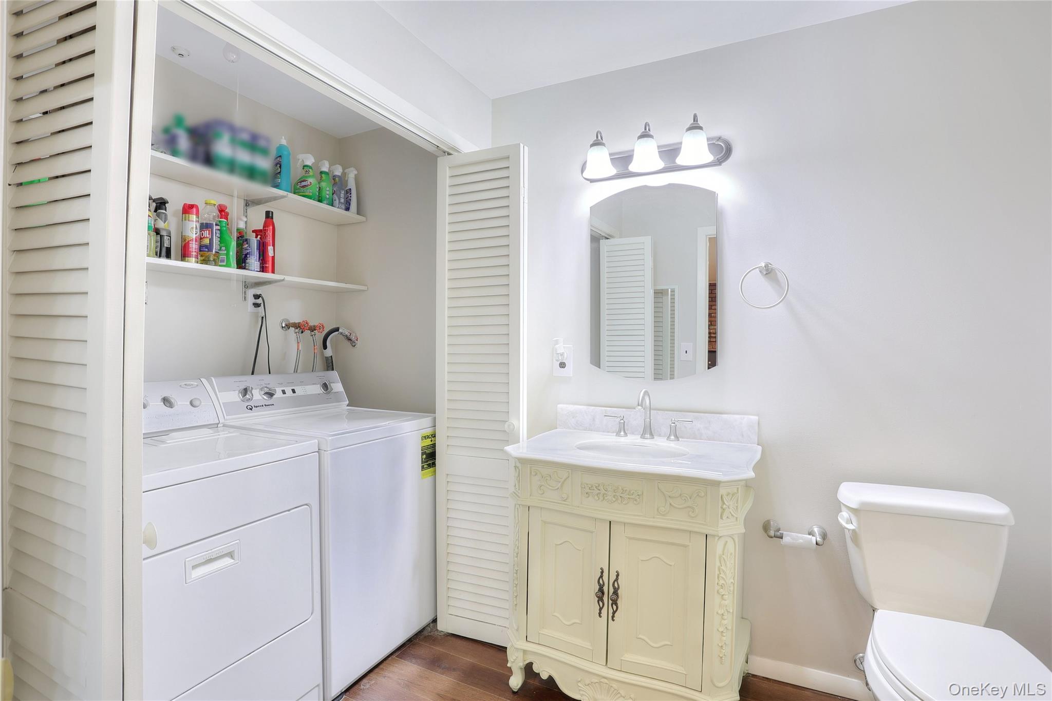 47 Camp Hill Road Pomona, NY 10970 - Photo 22 of 30 a bathroom with a toilet sink and mirror
