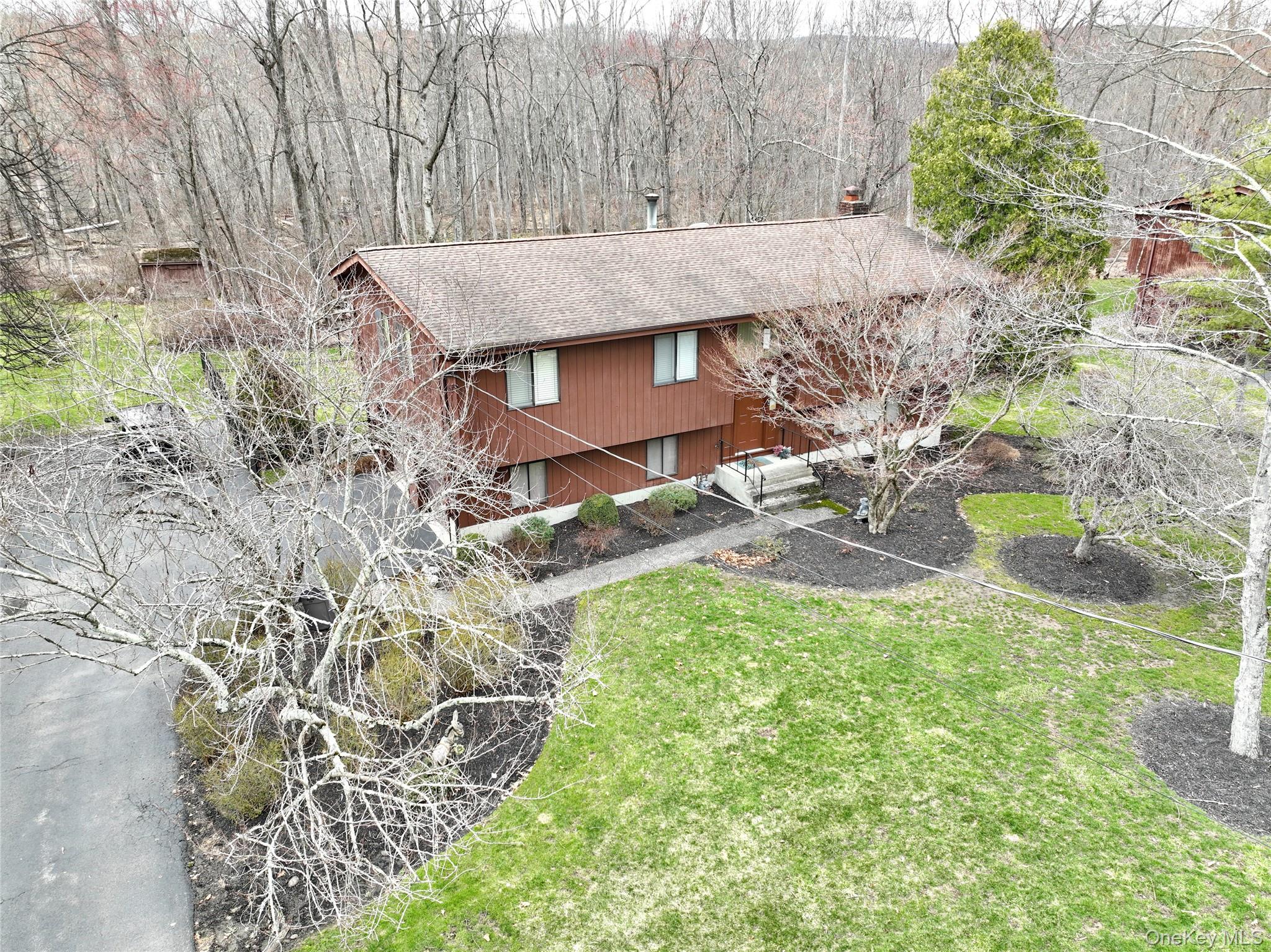 47 Camp Hill Road Pomona, NY 10970 - Photo 28 of 30 a view of a house with a yard