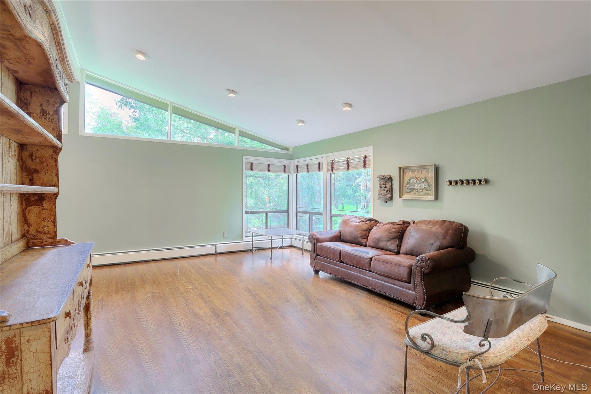 47 Camp Hill Road Pomona, NY 10970 - Photo 5 of 30 a living room with furniture and a large window