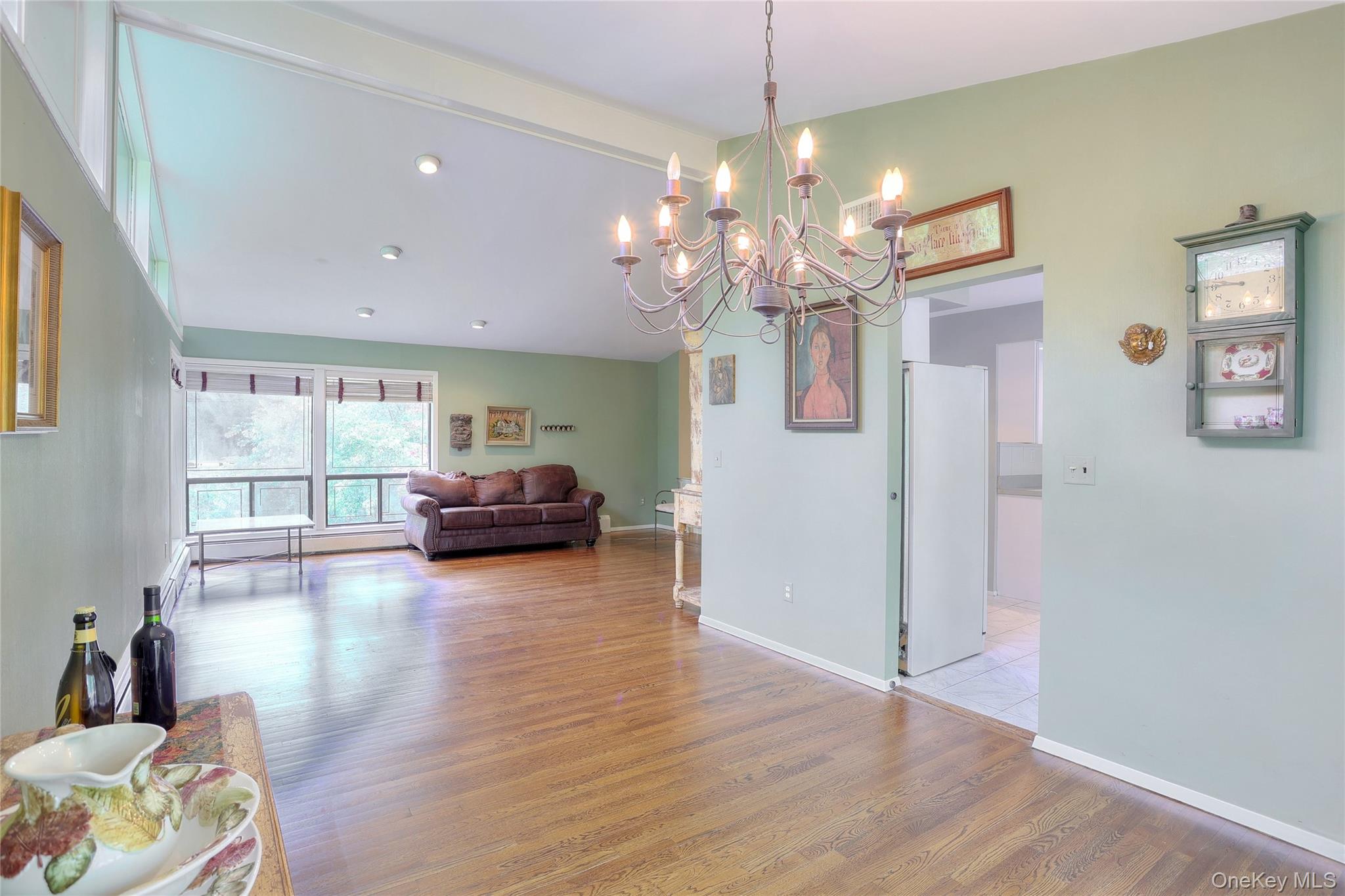 47 Camp Hill Road Pomona, NY 10970 - Photo 9 of 30 a living room with furniture and a chandelier