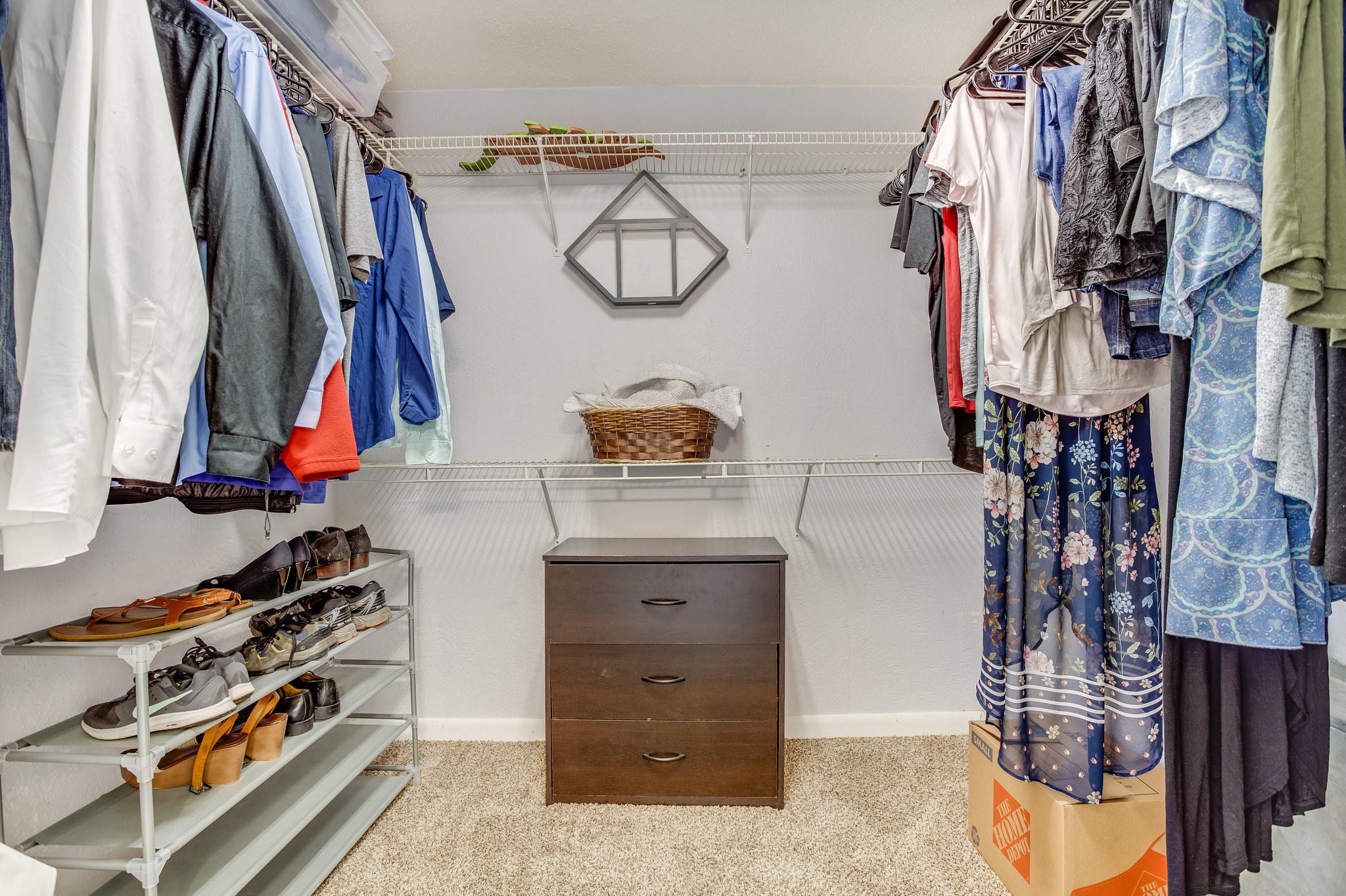 693 Robertsville Road Oak Ridge, TN 37830 - Photo 12 of 22 a view of walk in closet with clothes and shoes