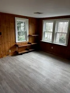 an empty room with windows
