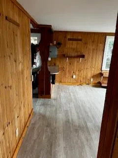 a stove top oven sitting inside of a kitchen