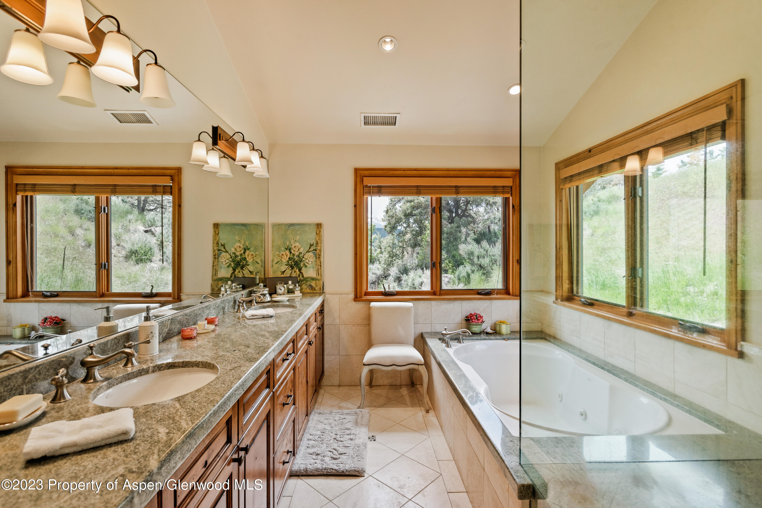 121 Ridge Road Basalt, CO 81621 - Photo 14 of 25 a large white room with a large window and couch