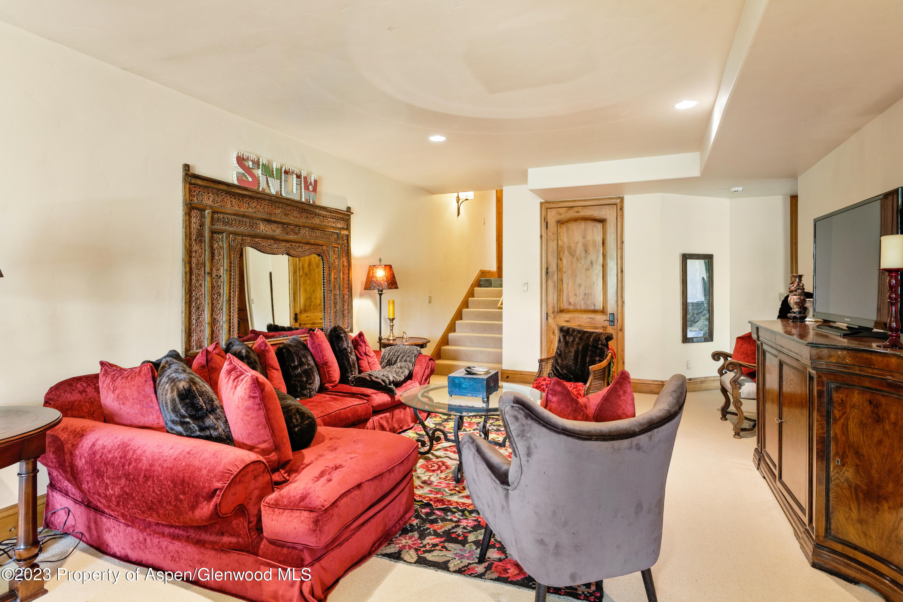 121 Ridge Road Basalt, CO 81621 - Photo 20 of 25 a living room with furniture a rug and a window