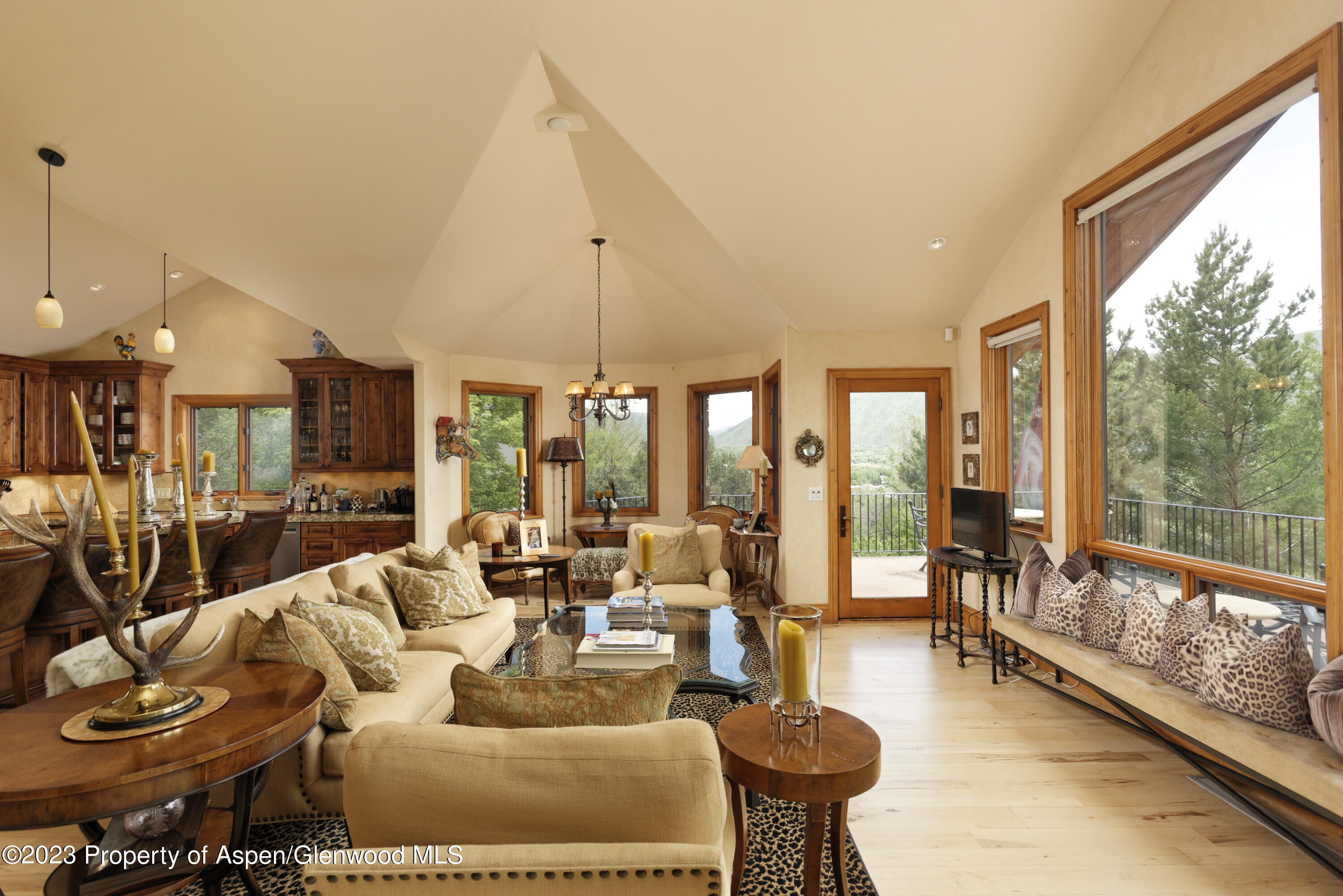 121 Ridge Road Basalt, CO 81621 - Photo 6 of 25 a living room with furniture and a large window