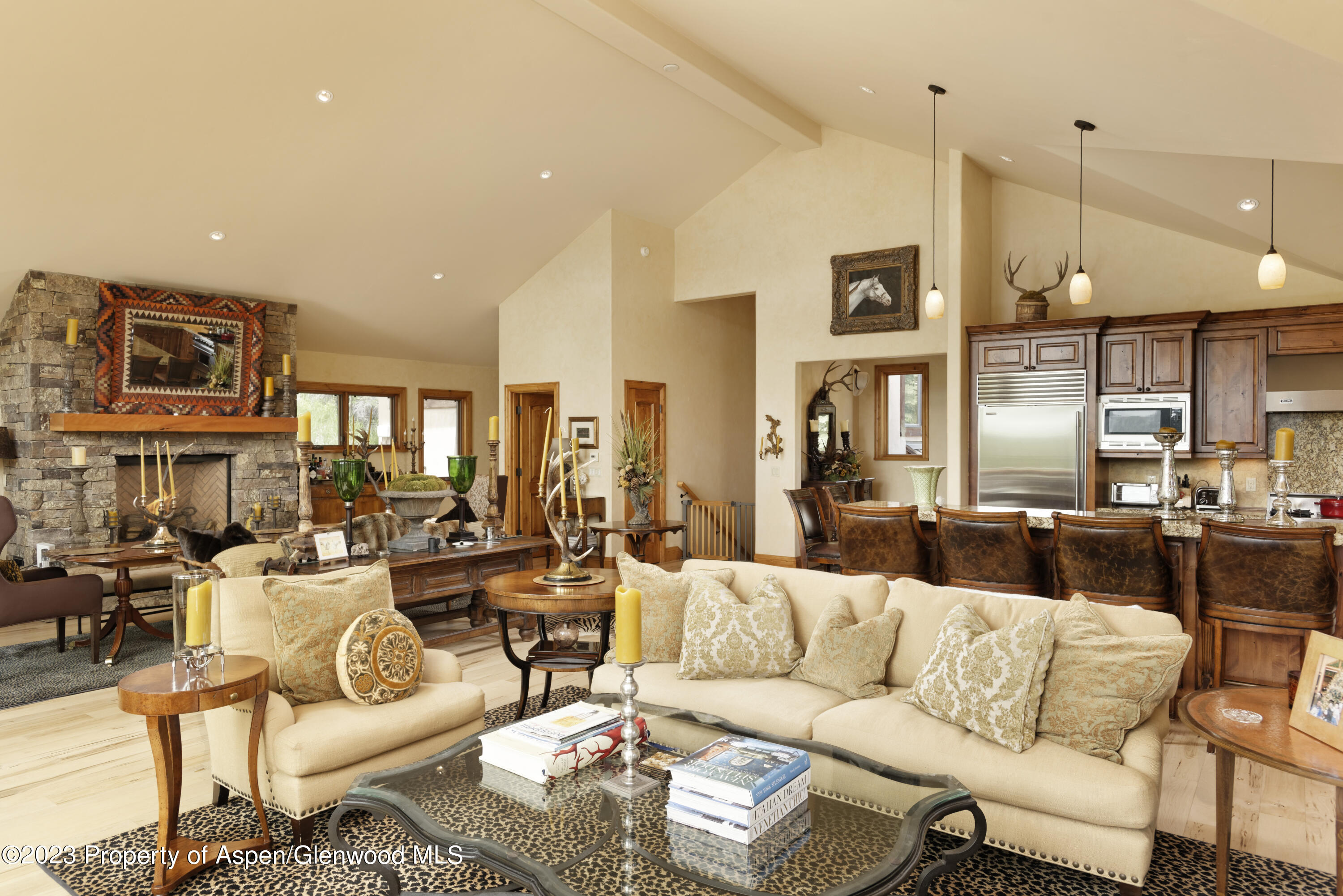 121 Ridge Road Basalt, CO 81621 - Photo 7 of 25 a living room with furniture kitchen view and a chandelier