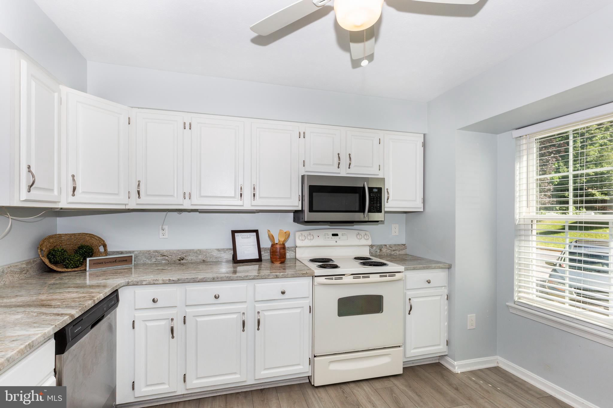 882 Gaming Square Hampstead, MD 21074 - Photo 7 of 46 Bright painted cabinets and gleaming Granite!