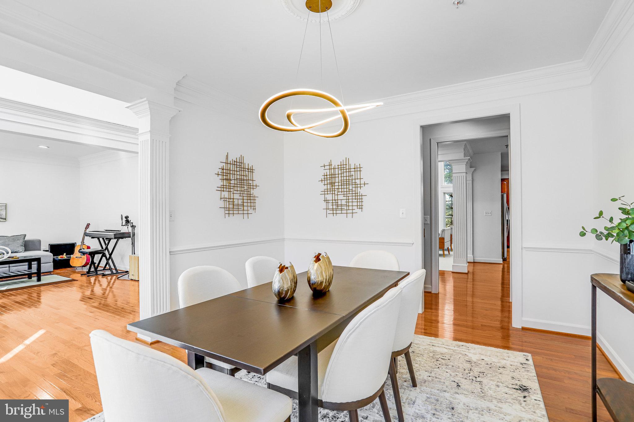 13107 English Turn Drive Silver Spring, MD 20904 - Photo 14 of 73 a living room with dining table and a large window