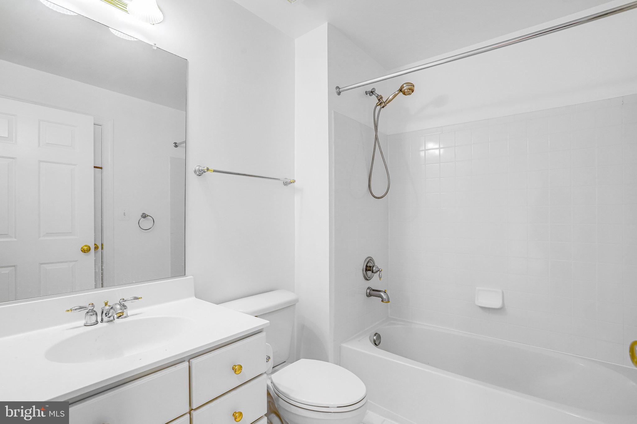 13107 English Turn Drive Silver Spring, MD 20904 - Photo 22 of 73 a bathroom with a sink toilet tub and shower