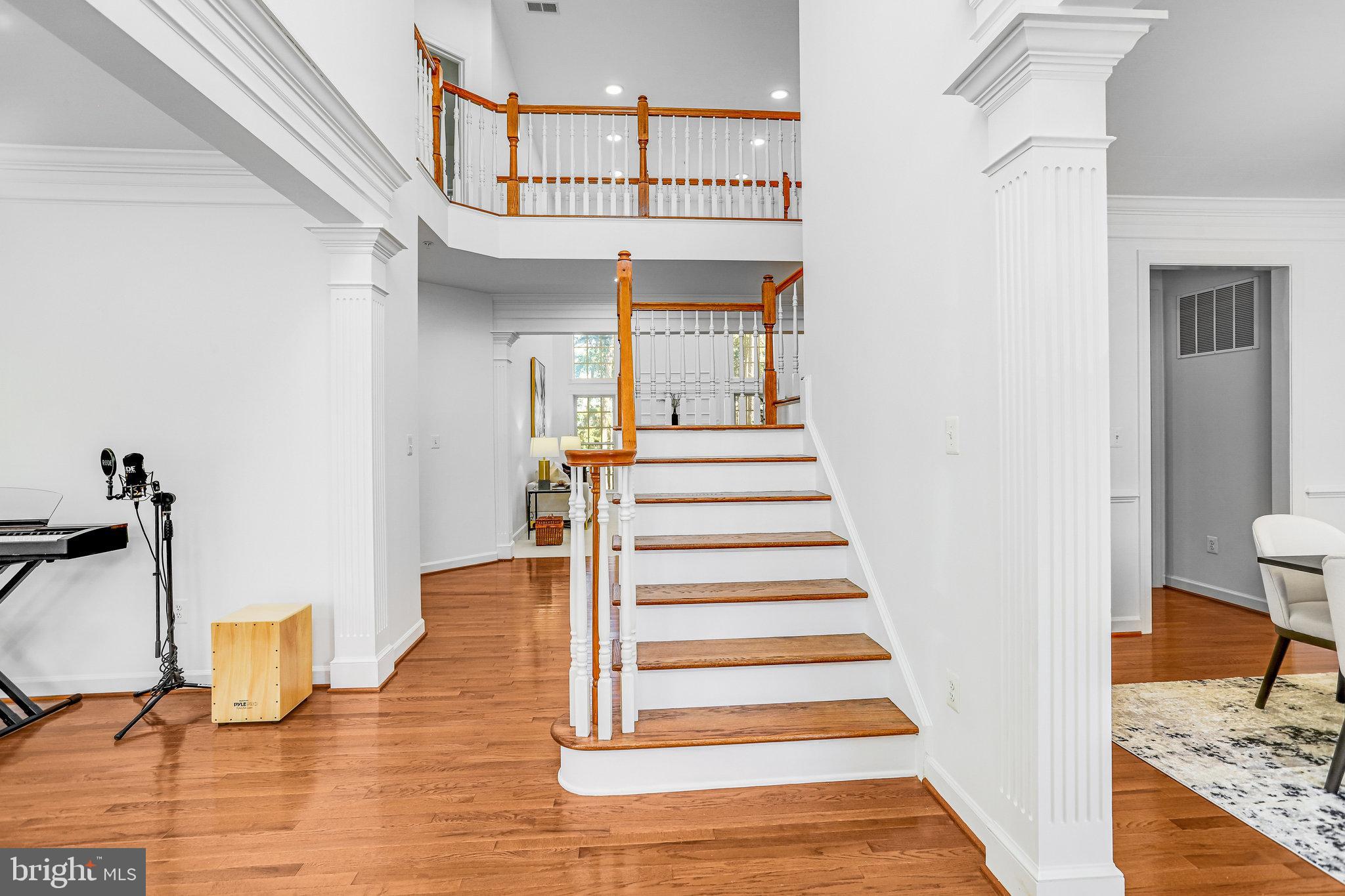 13107 English Turn Drive Silver Spring, MD 20904 - Photo 3 of 73 a view of entryway and hall with wooden floor