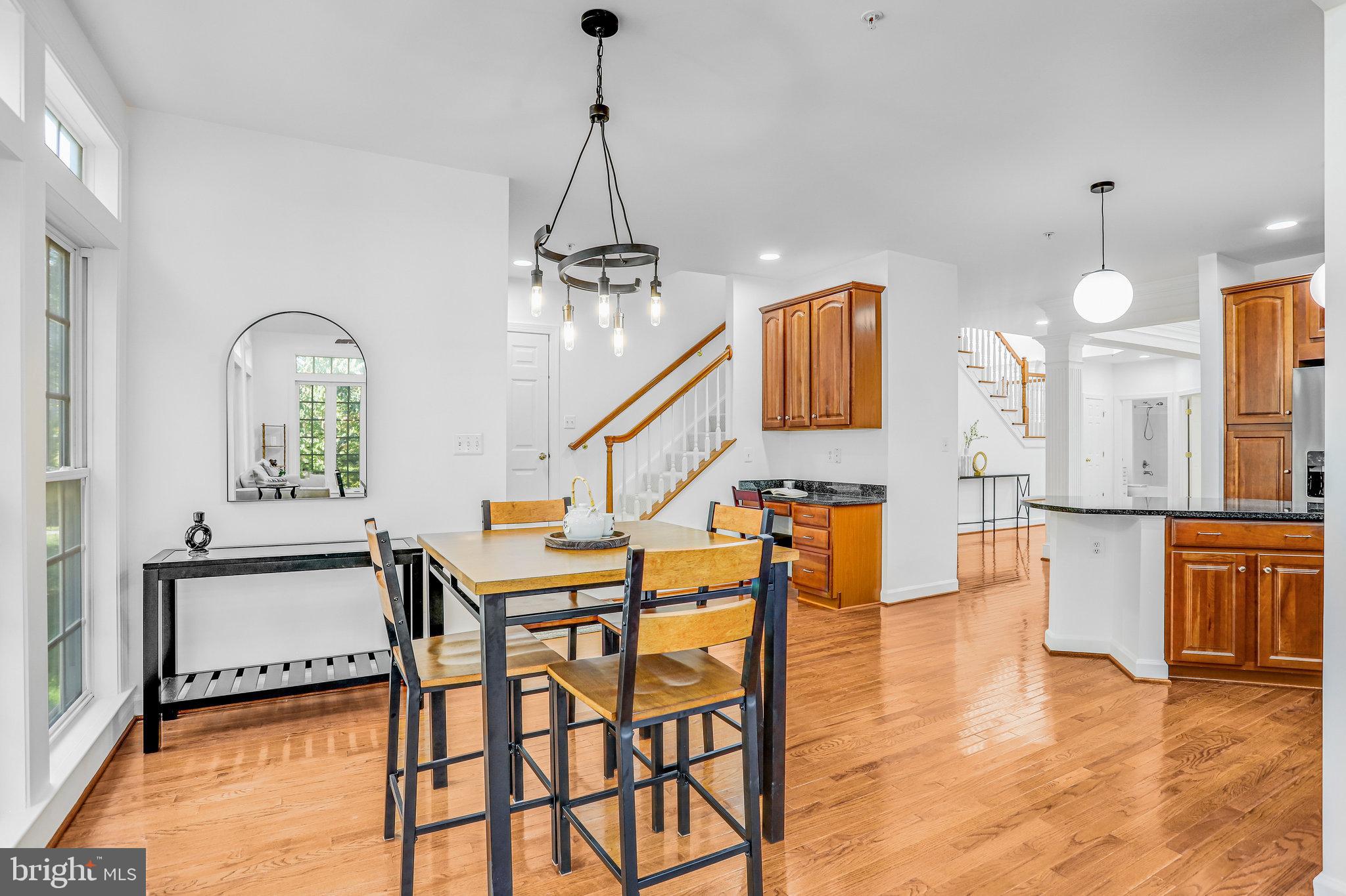 13107 English Turn Drive Silver Spring, MD 20904 - Photo 33 of 73 a view of a livingroom with furniture and a kitchen
