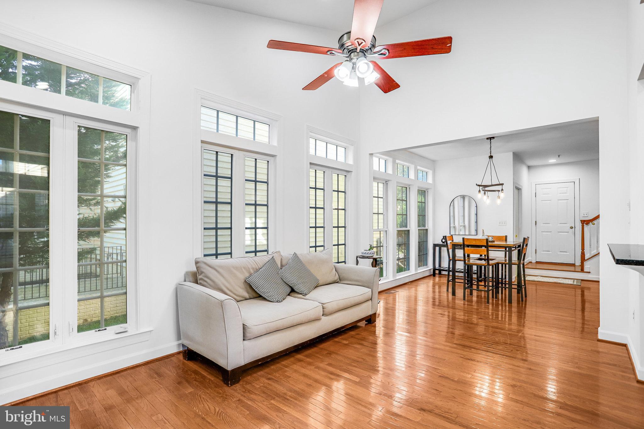 13107 English Turn Drive Silver Spring, MD 20904 - Photo 35 of 73 a living room with furniture and a large window