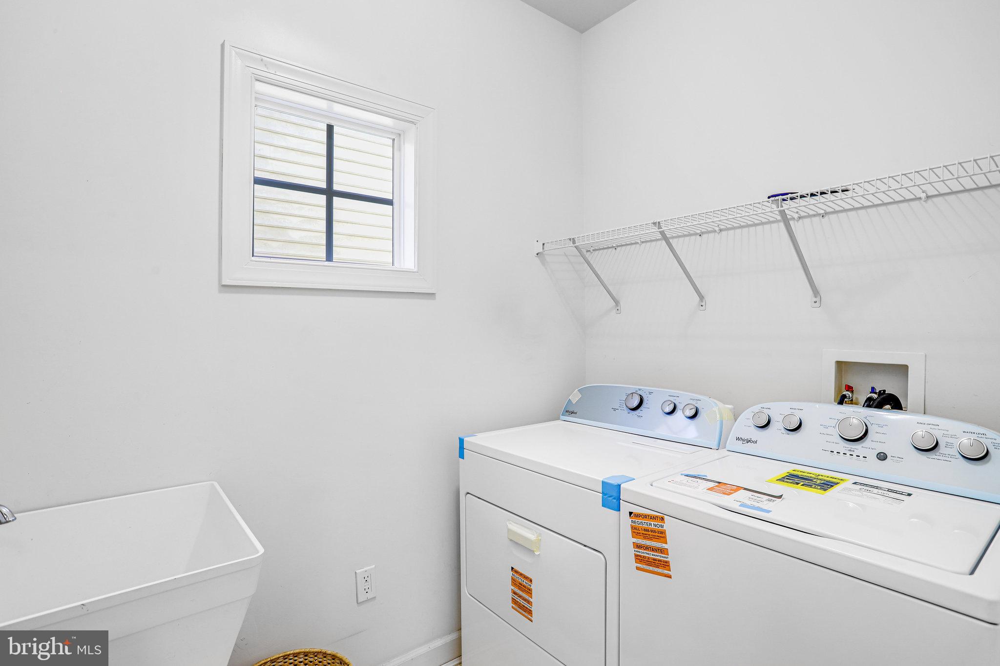13107 English Turn Drive Silver Spring, MD 20904 - Photo 39 of 73 a utility room with dryer and washer