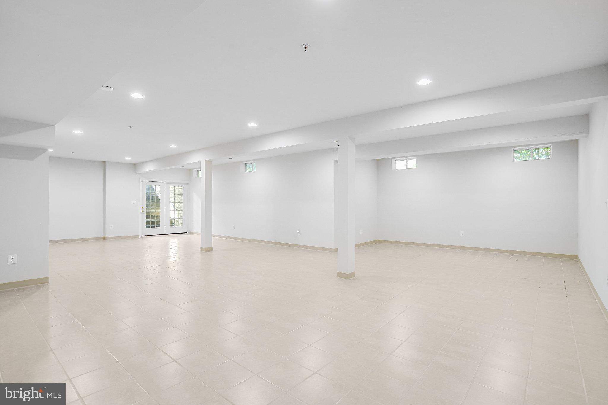 13107 English Turn Drive Silver Spring, MD 20904 - Photo 64 of 73 a view of an empty room with wooden floor
