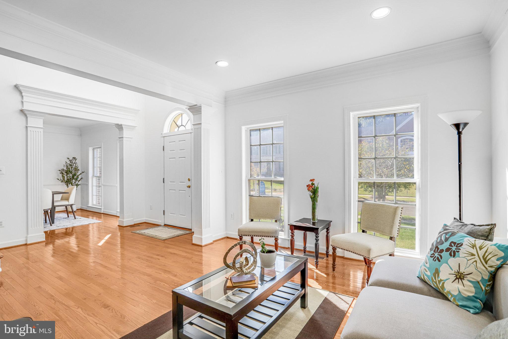 13107 English Turn Drive Silver Spring, MD 20904 - Photo 10 of 73 a living room with furniture and a large window