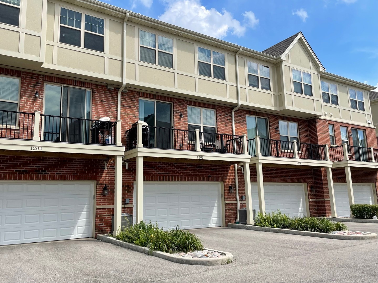 1234 Byrne Boulevard Vernon Hills, IL 60061 - Photo 11 of 12 a front view of a house with a garage