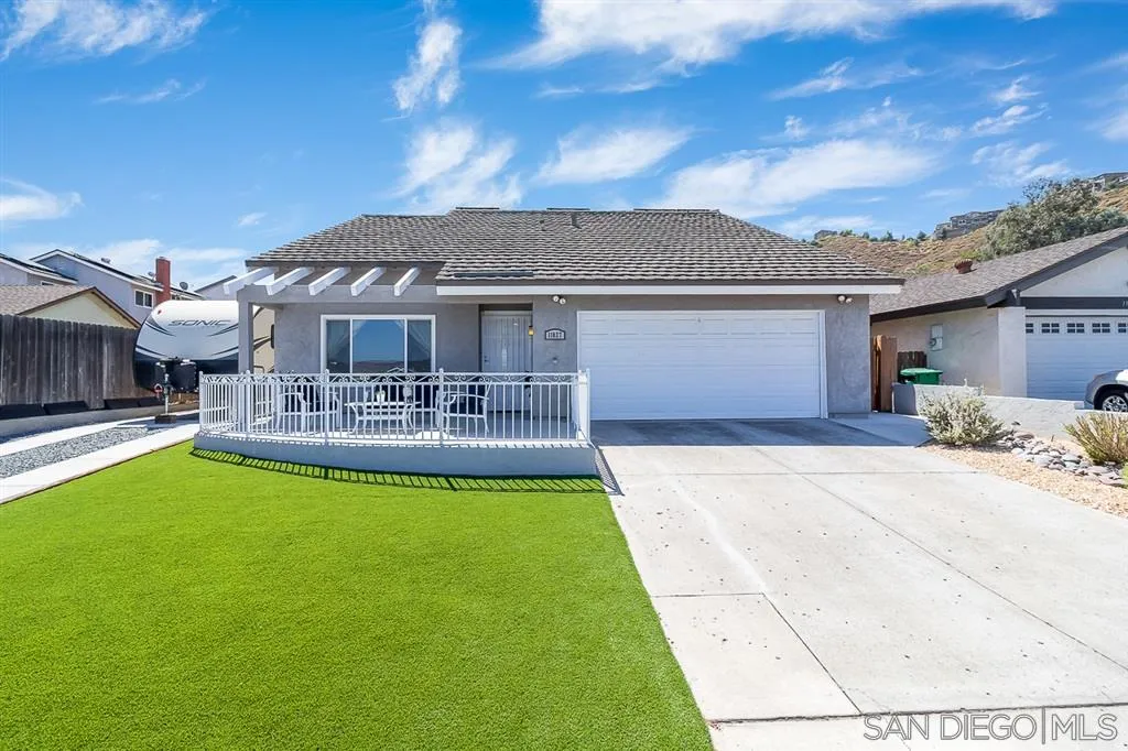 11027 Eddington Road Santee, CA 92071 - Photo 1 of 25 a house view with swimming pool and furniture